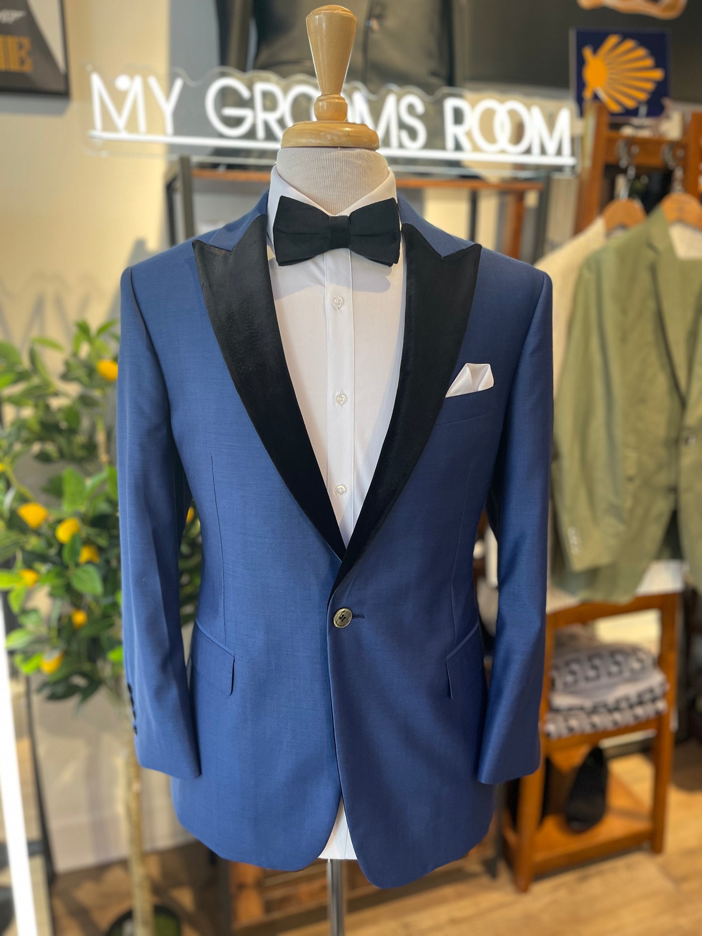 Luxurious Blue Tuxedo Jacket with Velvet Peak Lapel